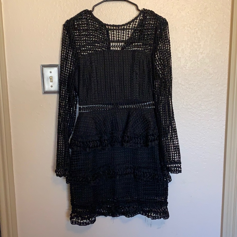 Black long sleeve short/mid length dress